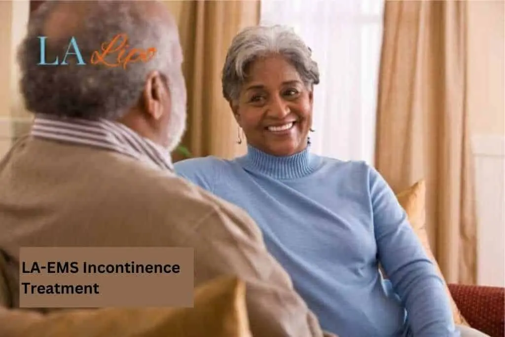 Couple sat smiling at each other - LA-EMS treatment Greenford