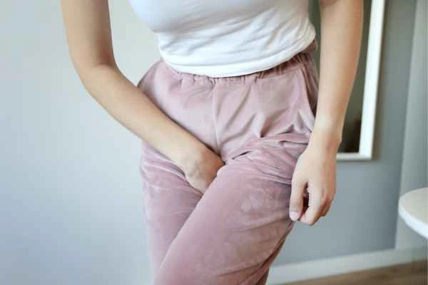 older woman running to the toilet because of urinary incontinence Greenford